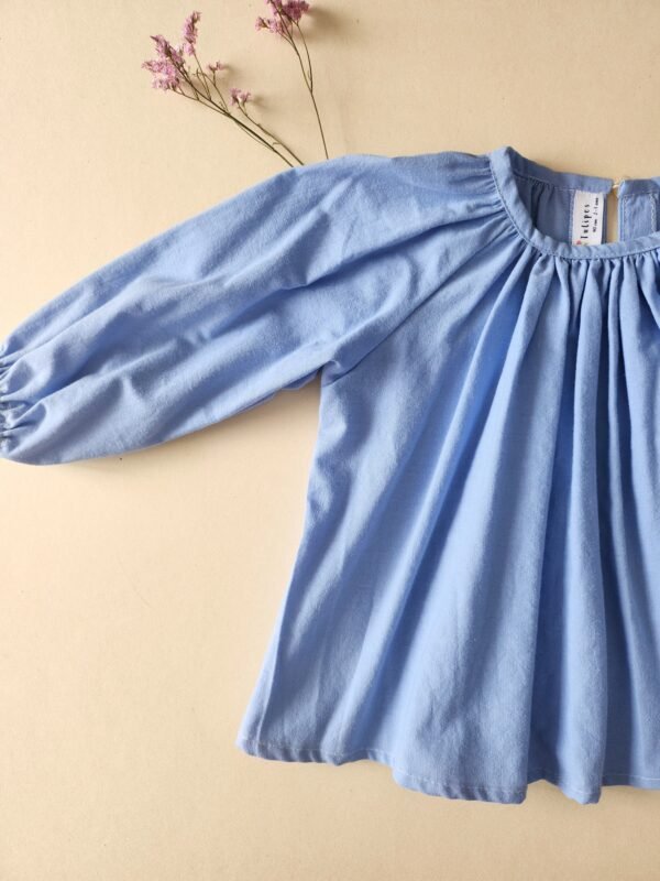 blouse-bleu-enfant-maison-tulipes-seconde-main Blouse mixte bleu ciel